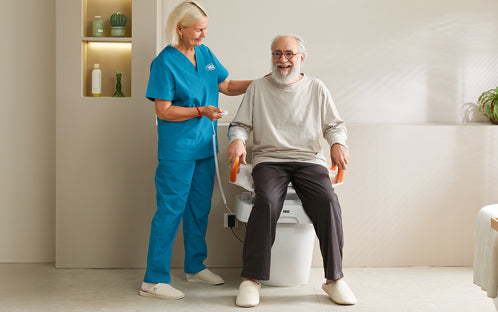 Who should consider an electric toilet lift as an addition to their bathroom?