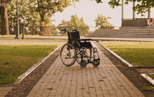 Manual wheelchair on the sidewalk