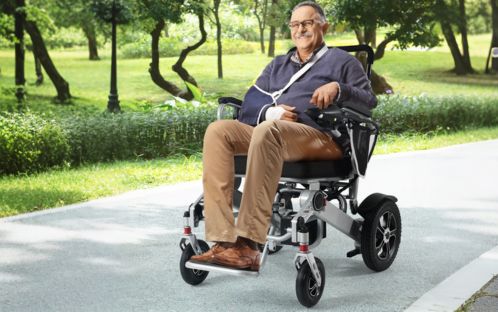 Elderly people driving electric wheelchairs