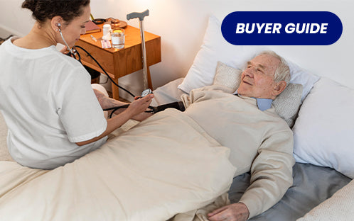 A caregiver assist paralyzed elderly in measuring blood pressure
