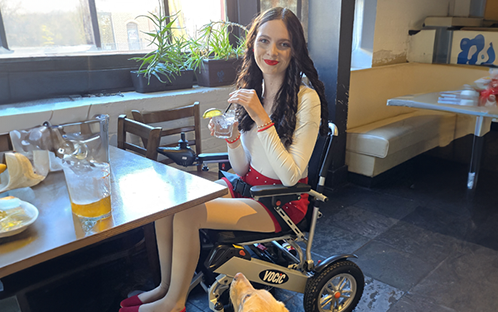  Aspen with her V62 wheelchair outside