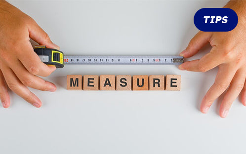 Measure a rollator walker width with a rule