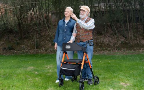Walking on the lawn using a roller walker with a seat