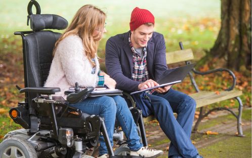 Young woman using wheelchair