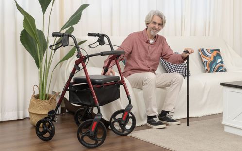 Man with 4 wheel walker
