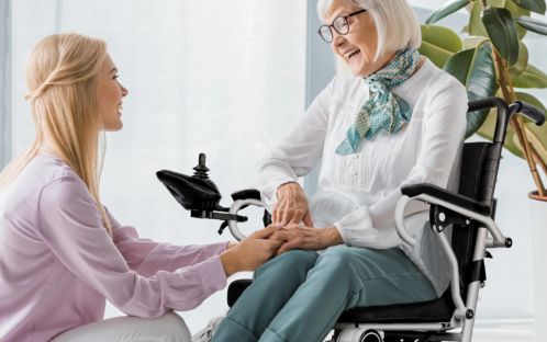 Woman sitting in an electric wheelchair