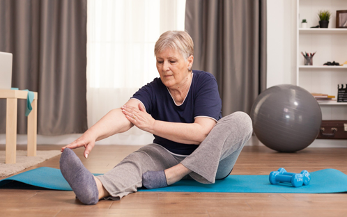 Seniors with arthritis are stretching