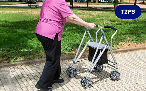 A senior with aluminum rollator walker for outdoor use